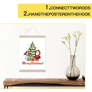 Detail of wooden magnetic hanger framing a festive Christmas poster with white hanging rope
