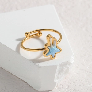 Golden butterfly ring with blue star accent on white stone, 18k gold plated open band