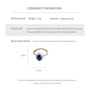 Detailed view of cutout diamond flower ring with zircon inlays and copper material specs