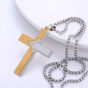 Two-tone stainless steel cross necklace with engraved Spanish prayer and gold screw motifs