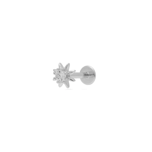 Detailed close-up of a S925 silver star earring with a sparkling clear zircon stone