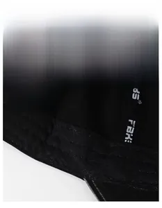 Macro detail of breathable moisture-wicking sweatband and woven label on black baseball cap