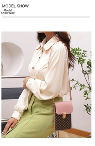 Chic pink and brown crossbody phone bag with geometric pattern and gold clasp detail