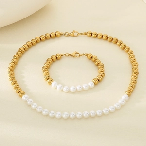 Parure collier et bracelet en acier titane plaqué or 18K avec perles de 6mm et dorées