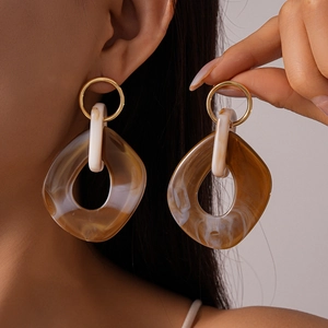 Irregular resin square hoop earrings with amber marble texture and gold metal accents