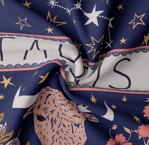 Macro detail of Taurus constellation tapestry fabric showing premium texture and print