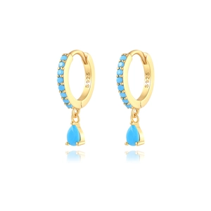 Close-up of S925 silver earring featuring luxurious teal crystal water drop and engravings