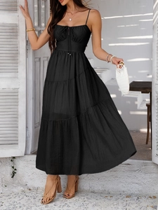 Elegant black tiered spaghetti strap midi dress with tie-front detail for resort wear