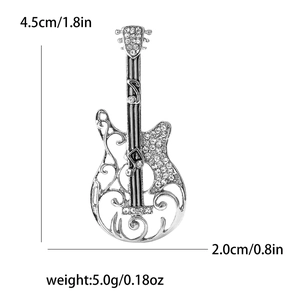 Detailed view of silver guitar brooch with dimensions 4.5cm by 2.0cm and weight 5.0g
