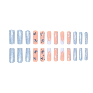 Blue glitter French press-on nails with butterfly designs and rhinestones