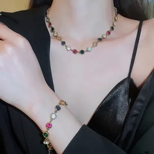 Luxury gold bracelet set with multi-color gemstone round charms for women