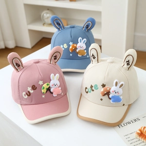 Kids' cartoon baseball caps with 3D bunny ears in pink, blue, and beige colors
