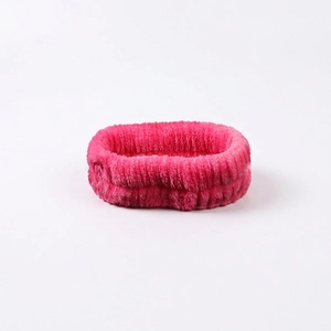 Detail of rose red coral fleece headband with soft absorbent texture for face washing