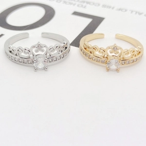 Adjustable crown rings in gold and silver finish with sparkling center oval crystals