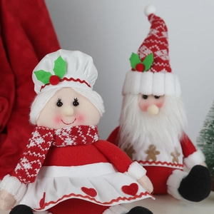 Couple de gnomes de Noël en peluche avec toque de chef et motif bonhomme en pain d'épice