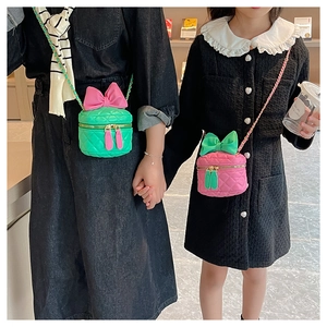 Quilted crossbody bags for girls featuring contrasting bows and metal chain straps
