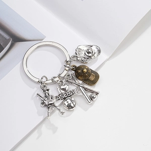Detail of vintage baseball metal keychain with glove, bat, and 'I ♥ BASEBALL' charms