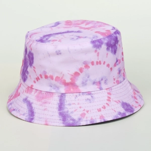 Creative tie-dye bucket hat with purple and pink spiral patterns on canvas fabric