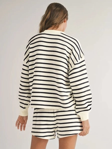 Back view of a striped knit set featuring a long-sleeve sweatshirt and matching shorts
