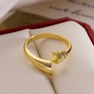 Polished 18K gold plated minimalist open geometric ring displayed in a premium jewelry box