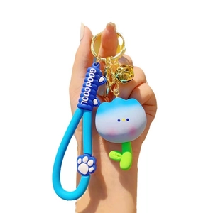 Cute cartoon blue tulip resin keychain with blue silicone strap and gold metal bell charm