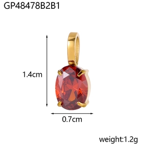 Minimalist stainless steel gold pendant with a red cubic zirconia teardrop stone
