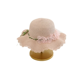 Girls sweet straw sun hat with pink chiffon flower and pearl detail for summer outdoor