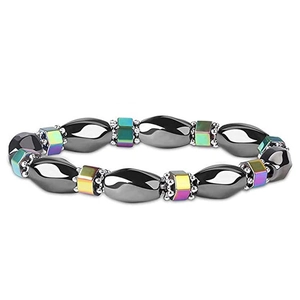 Detailed macro view of elastic yoga bracelet with black hematite and colorful cube magnets