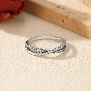 Vintage S925 sterling silver twisted ring with cross design and sparkling zircon pavé