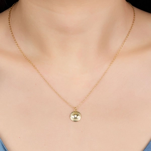 Minimalist S925 silver necklace with golden evil eye diamond pendant on model