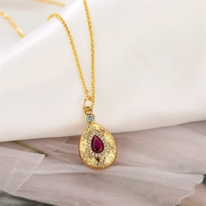 Vintage gold copper necklace with water drop pendant and micro-set red pear gemstone
