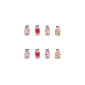 Faux ongles roses à coller avec motifs cœurs bleus, nœuds 3D beiges et dégradé blush