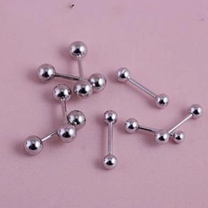 Macro detail of silver stainless steel barbell earrings with double ball screw backs