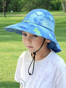 Detail of light blue sun hat with dinosaur prints, neck protection, and mesh vents