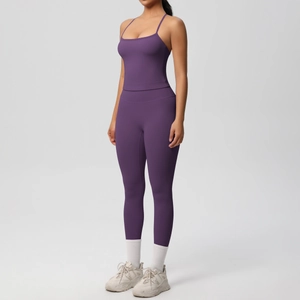 Close-up of purple yoga set showing fine straps and smooth double-sided brushed fabric