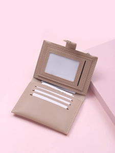 Detail view of beige PU leather wallet showing inner card slots and ID window