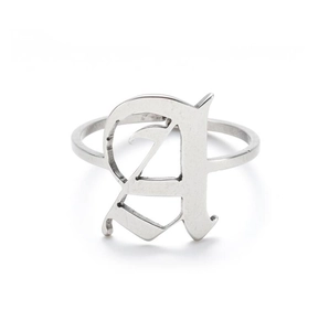 Detailed view of the Old English style capital letter A on a silver stainless steel ring