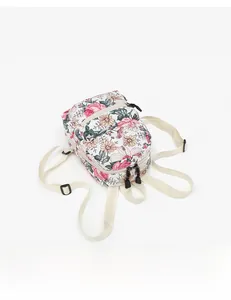 Detail shot of the dual-layer zipper design on the floral canvas backpack for students