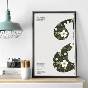 Detail of vintage Christmas background paper with floral typography in a sleek black frame