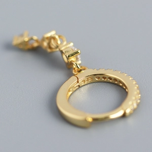 Elegant 925 sterling silver gold hoop earrings with geometric crystal tassels in macro view