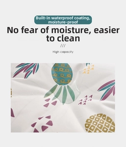 Detail of waterproof non-woven storage bag with pineapple print and water droplets