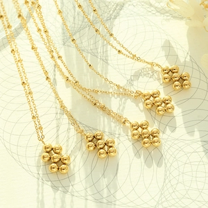 Gold-plated jewelry set with cluster bead pendants and mixed chain link necklaces