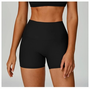 Detailed view of black high-waisted ribbed yoga shorts showing fabric texture and wide waistband