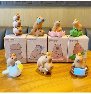 Set of seven cute resin capybara figurines with various poses for desktop decoration