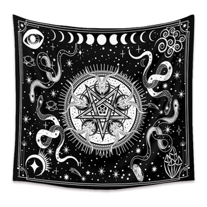 Close-up of bohemian wall tapestry featuring goat skull pentagram and moon phases