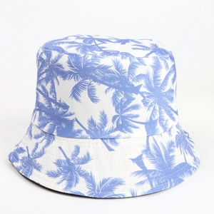 Reversible coconut tree leaf print bucket hat in white and blue for outdoor sun protection