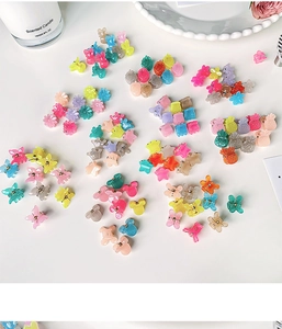 Macro shot of 10-piece mini colorful butterfly and flower hair clips for girls