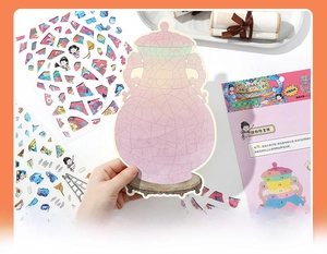 Close-up of DIY vintage landscape collage sticker kit with vase base and numbered pieces