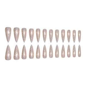 Macro shot of 24 pieces long stiletto press-on nails with sparkling pink laser glitter