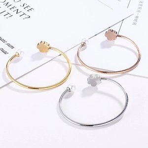 Minimalist stainless steel open bangle set with flower charm and white pearl decor